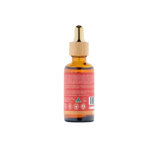 Amber glass dropper bottle with a gold cap on a light gray background