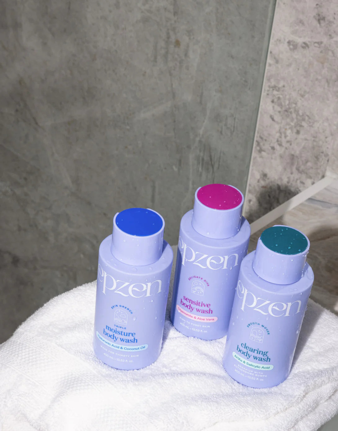 400ml blue bottle of Epzen Triple Moisture Body Wash featuring hyaluronic acid, coconut oil, and a flip-top lid.