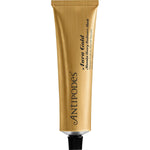 Antipodes Aura Gold Manuka Honey Radiance Mask 75ml tube with golden floral illustrations on a white background.