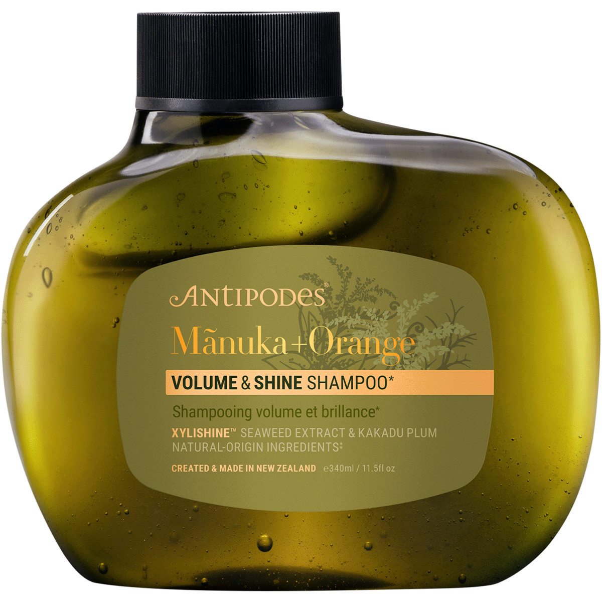 Antipodes Manuka + Orange Volume & Shine Shampoo 340ml bottle with a white pump and botanical label illustrations.