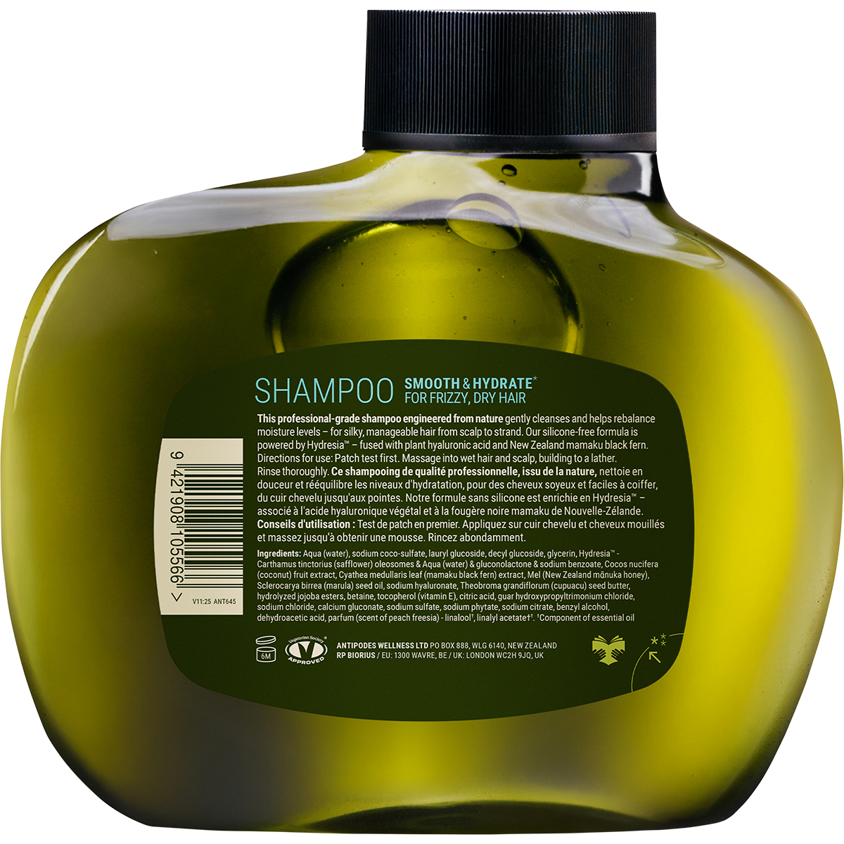 Back of Antipodes Peach Freesia shampoo bottle showing ingredients and directions on a minimalist white and brown label.