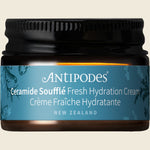 Antipodes Ceramide Souffle mini 15ml glass jar with a black lid on a white background.