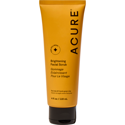 Yellow tube of ACURE Brightening Facial Scrub, 118ml, with sea kelp and French green clay on a white background.