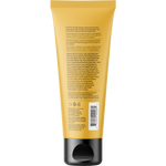 Back of a 118ml ACURE Brightening Facial Scrub tube with directions, warnings, and ingredients on a white background.