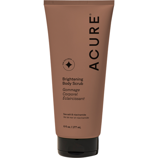 177ml tube of ACURE Brightening Body Scrub with niacinamide and sea salt on a white background.