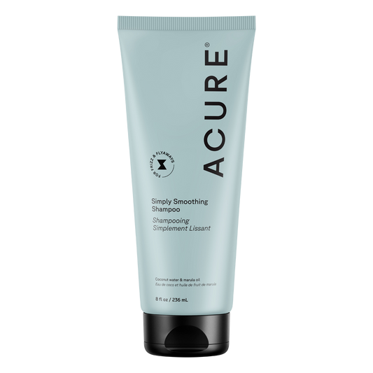 236.5ml bottle of ACURE Simply Smoothing Shampoo with coconut and marula oil for frizz-prone hair.