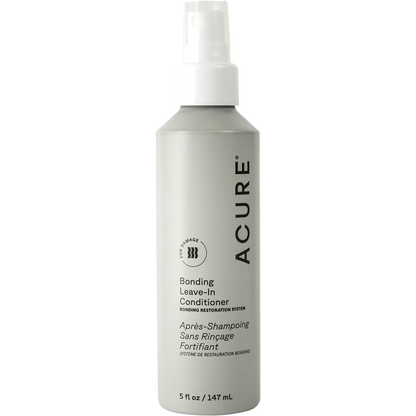 White spray bottle of ACURE Bonding Leave-In Conditioner 147ml with a clear cap and purple and blue label.