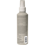 Back of ACURE Bonding Leave-In Conditioner bottle featuring ingredient list and usage directions on a white background.