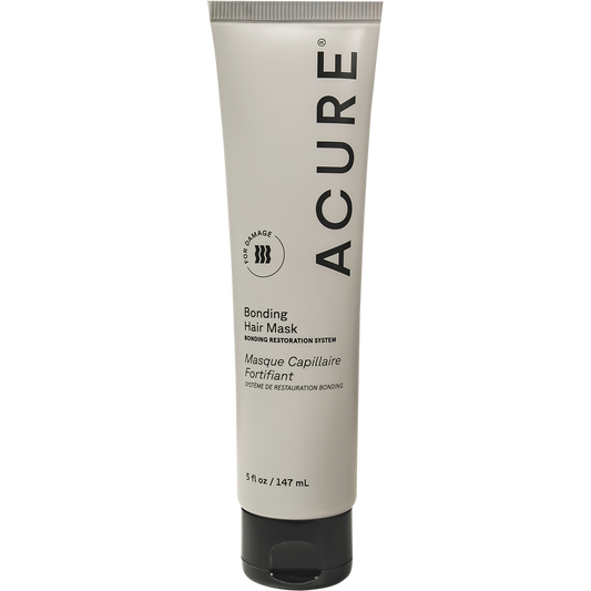 Acure Bonding Hair Mask in a 147ml squeeze tube with a purple and white label on a clean white background.