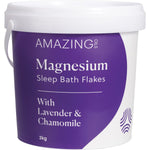 2kg tub of Amazing Oils Magnesium Sleep Bath Flakes with lavender and chamomile illustrations on a white background.