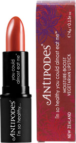 Antipodes Boom Rock Bronze Lipstick 4g in a black tube with a warm medium brown shade on a white background.