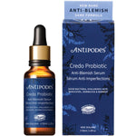 Antipodes Credo Probiotic Anti-Blemish Serum 30ml amber bottle with a dropper and a green box on a white background.