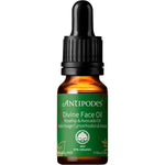 Antipodes Divine Rosehip and Avocado Face Oil 10ml mini bottle with a dropper next to its matching green and white box.