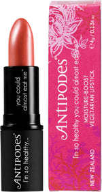 Antipodes Dusky Sound Pink Lipstick 4g in a black tube with a dusky pink box featuring botanical illustrations.