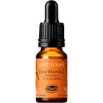Mini 10ml Antipodes Glow Vitamin C Serum glass bottle with a white dropper and gold cap on a white background.