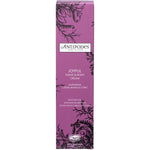 120ml tube of Antipodes Joyful Hand and Body Cream with pink and yellow hibiscus flowers on a white background.