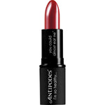 Antipodes Oriental Bay Plum Lipstick in a sleek black tube showing the deep purple-red shade on a white background.