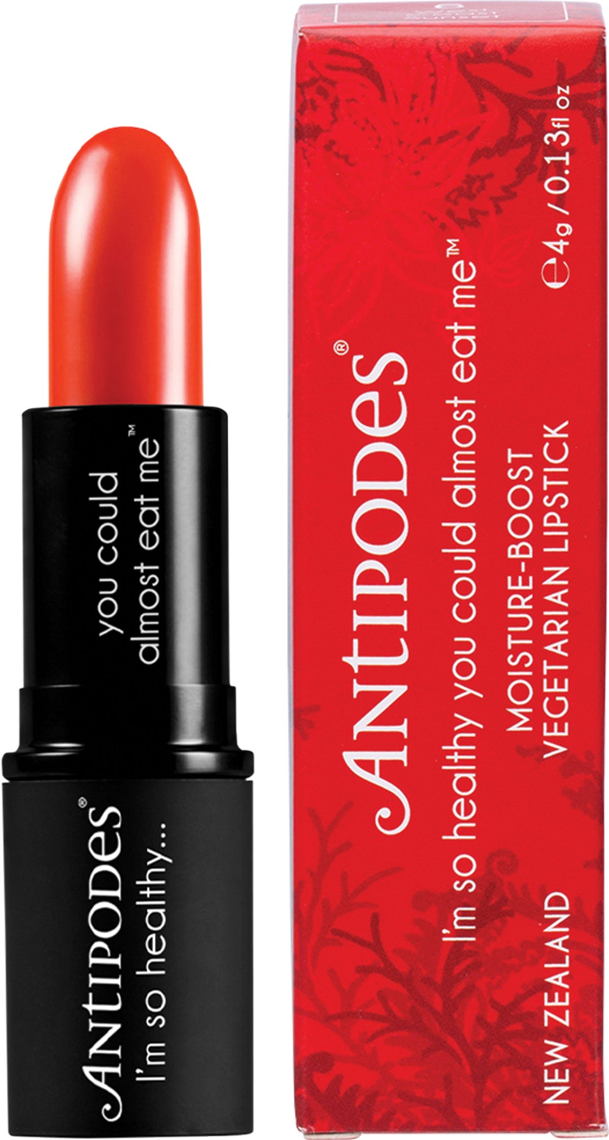 Antipodes West Coast Sunset Lipstick in a black tube, featuring a vibrant orange-red shade on a white background.