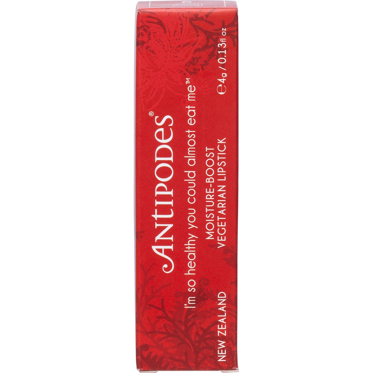 Antipodes West Coast Sunset Lipstick in a black tube, featuring a vibrant orange-red shade on a white background.
