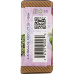 Close-up of a pink and white Auromere Himalayan Rose Ayurvedic Soap box featuring a yellow arnica flower illustration.
