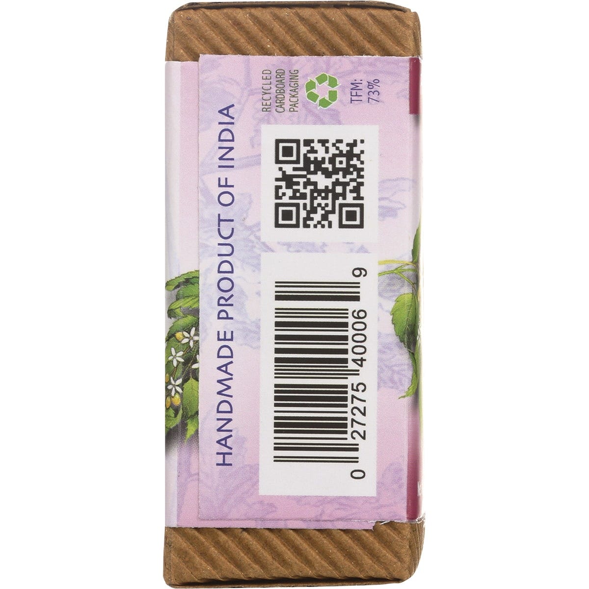 Close-up of a pink and white Auromere Himalayan Rose Ayurvedic Soap box featuring a yellow arnica flower illustration.