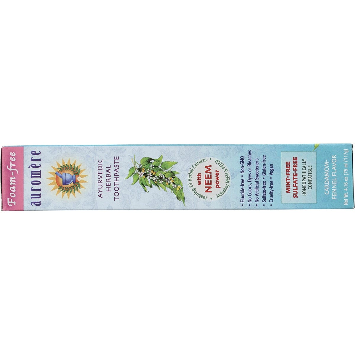 Close-up of Auromere Cardamom-Fennel toothpaste tube and box with herbal ingredients and fluoride-free label.