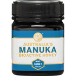 250g jar of Australia's Manuka Bioactive Honey MGO100+ with a gold lid and botanical label.