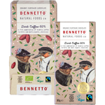 Two Bennett Natural Foods chocolate bar boxes on a white background, featuring an illustration of a bird in a tuxedo with cocoa pods and leaves. The packaging highlights 'Organic Fairtrade Chocolate', 'Dark Coffee 60%', and '80g e'.
