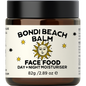 Amber glass jar of Bondi Beach Balm FACE FOOD with a black lid and minimalist white label.