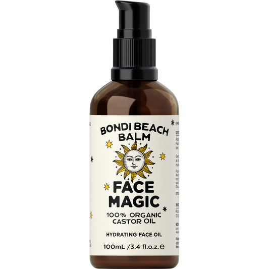Amber glass bottle of Bondi Beach Balm Face Magic Organic Castor Oil with a black pump dispenser and white label.