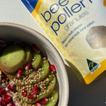 Close-up of multi-colored Natural Life Bee Pollen Granules showing their natural texture and variety.