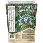 Botanika Blends Golden Chai Latte 500g protein tub with a scoop of powder and cinnamon sticks on a white background.