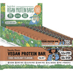 12-pack of Botanika Blends Choc Hazelnut vegan protein bars in a purple box with chocolate and hazelnut illustrations.