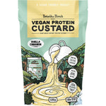 120g pouch of Botanika Blends Vanilla Cinnamon Vegan Protein Custard with a white and tan label.