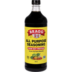946ml bottle of Bragg Liquid Aminos All Purpose Seasoning, a gluten-free soy sauce alternative with a yellow label.