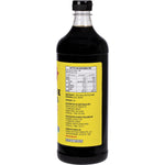 946ml bottle of Bragg Liquid Aminos All Purpose Seasoning with a yellow and red label on a white background.