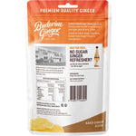 Golden pieces of Buderim Naked Ginger Sliced on a clean white background.
