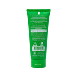 A green squeeze tube of herbal supplement powder shown from the back, featuring detailed product information, usage instructions, and a barcode on a plain white background.