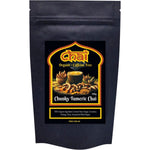 100g pack of Chai Tea Organic Chunky Turmeric Chai with various organic spices on a white background.