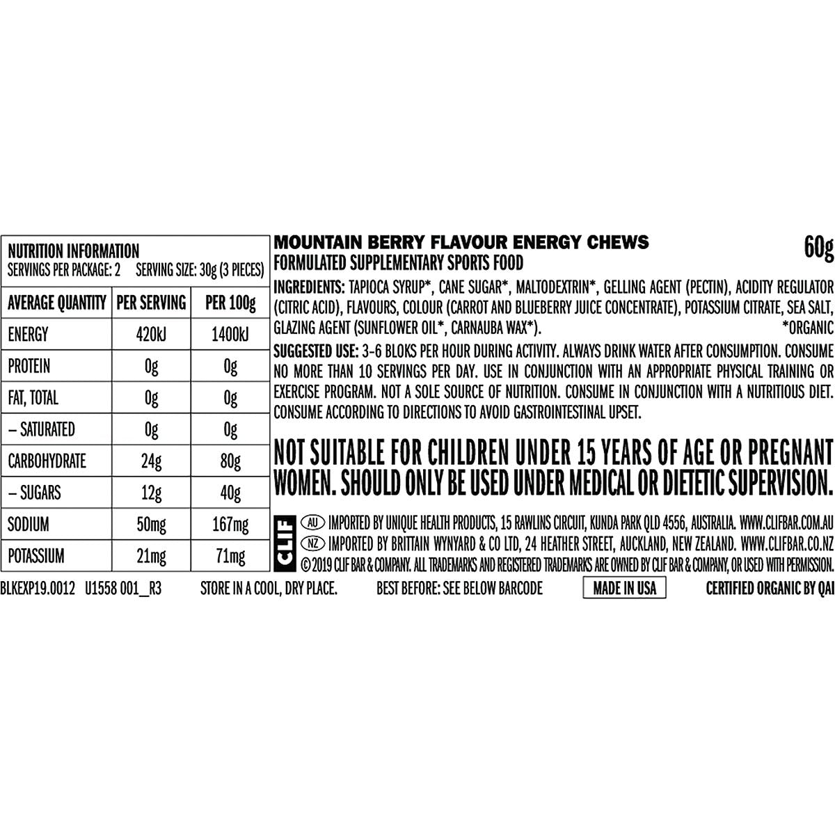 Close-up of a purple CLIF Bloks Mountain Berry energy chew packet showing 100 calories and 33mg sodium per serving.