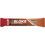 Individual packet of orange-flavored CLIF Bloks Energy Chews with caffeine on a white background.