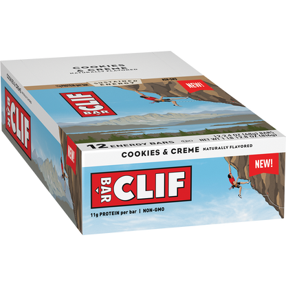 A display box containing 12 Clif Energy Bars in Cookies & Creme flavor with blue and white packaging.