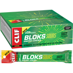 A green packet and a single sleeve of CLIF Bloks Sour Green Apple energy chews showing six individual cubes.