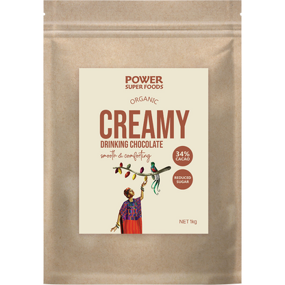 1kg bag of Power Super Foods Creamy Drinking Chocolate with a blue label and organic cacao illustrations.