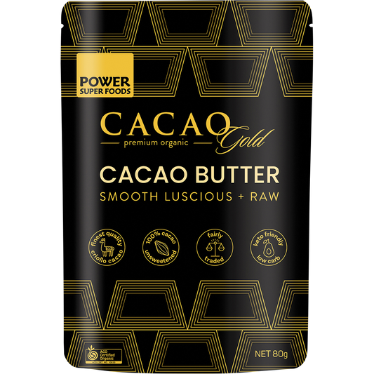 80g pouch of Power Super Foods Cacao Gold Butter Chunks with a gold and white label showing raw cacao butter pieces.
