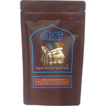 150g bag of Organic Rainbow Spiced Cacao Chai Tea with raw cacao and organic spices on a white background.
