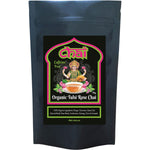 70g pack of Chai Tea Organic Tulsi Rose Chai featuring rose petals and spices on a white background.