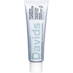 Davids 50g peppermint sensitive and whitening toothpaste in a recyclable metal tube on a white background.