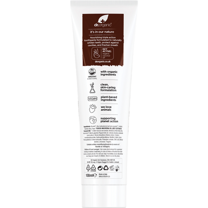 Back of Dr Organic Coconut Oil Toothpaste 100ml tube with nutrition facts, ingredients, and usage directions.