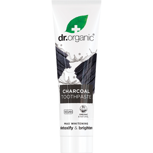 100ml tube of Dr Organic Charcoal Whitening Toothpaste with a grey and silver label on a white background.